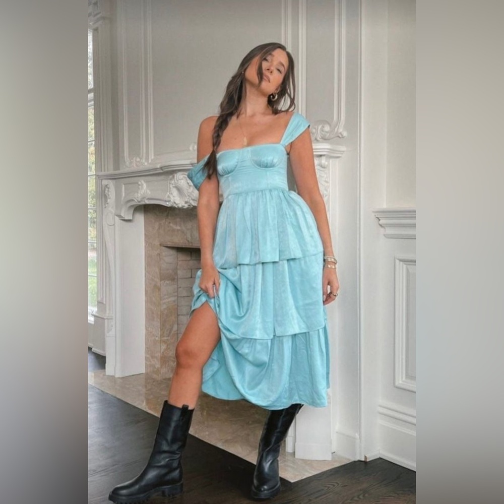 Never worn beautiful blue ruffle dress perfect for any occasion!
